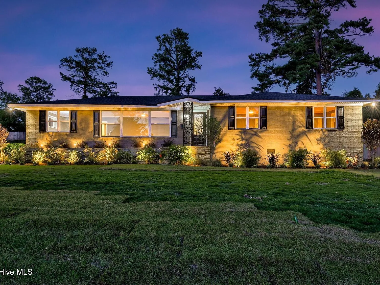 1135 Crestview Avenue, North Augusta SC — renovated home at dusk with private pool