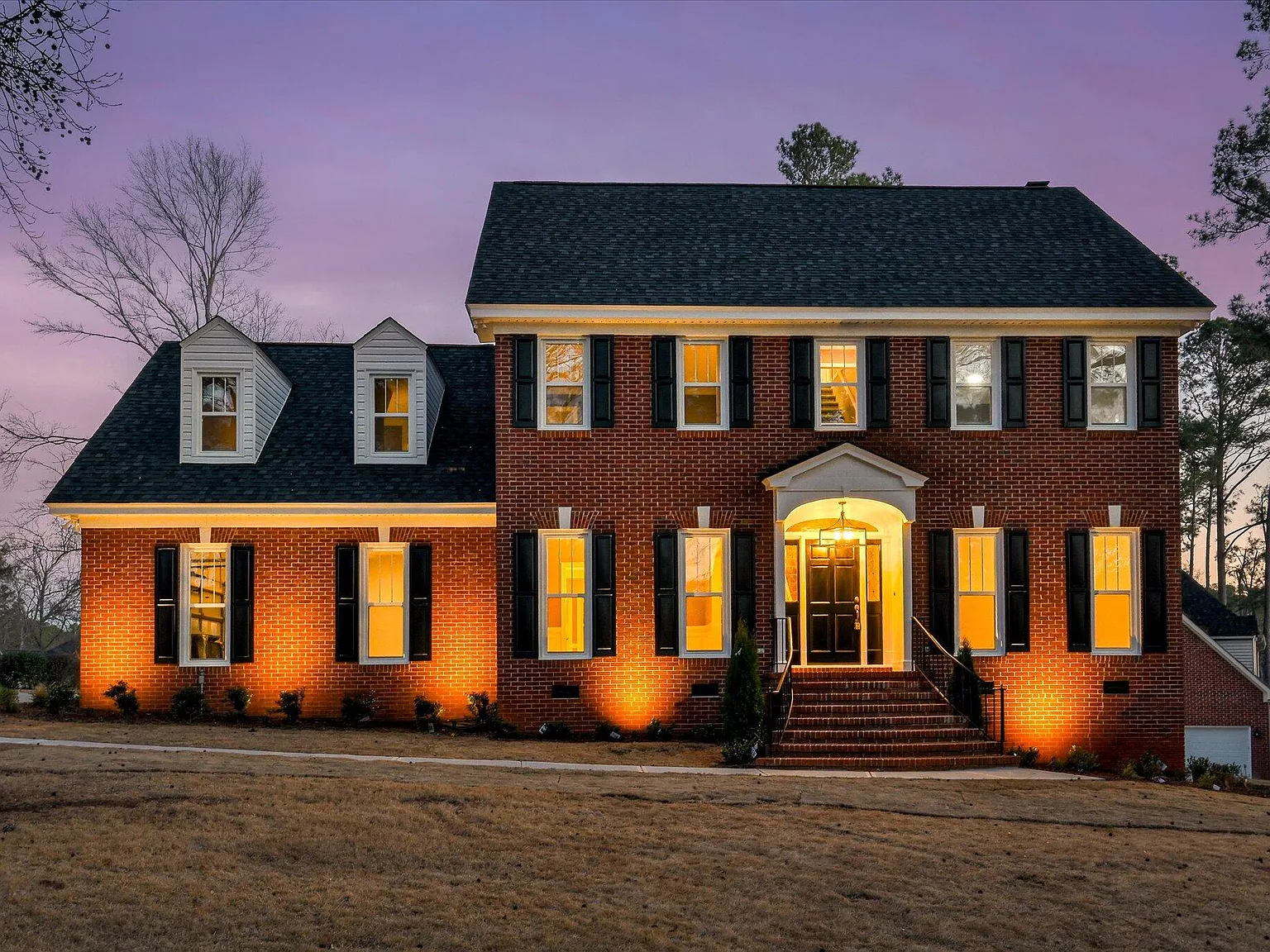 2 Shadowmoor Court, North Augusta SC — renovated brick home photographed at dusk