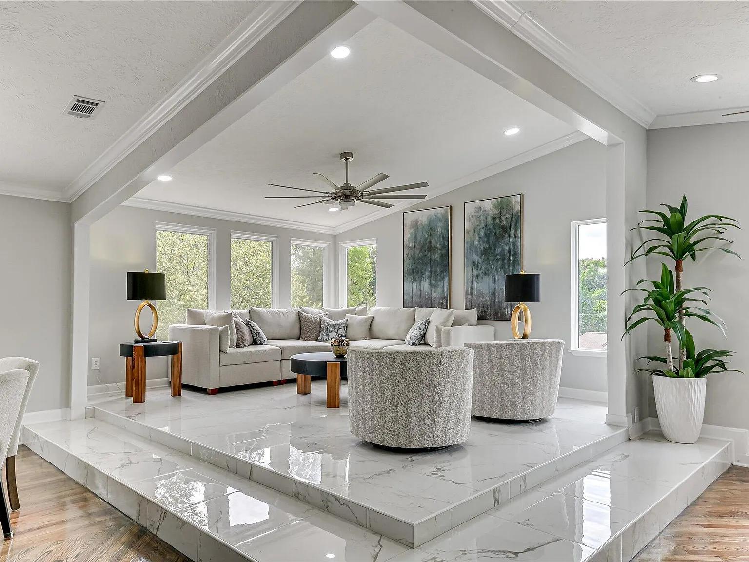Renovated living room with marble flooring at 2417 Wilkshire Drive, now a Masters Week hospitality rental
