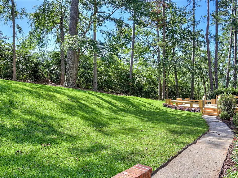 Backyard lawn and rear yard at 4 Shadowmoor Court