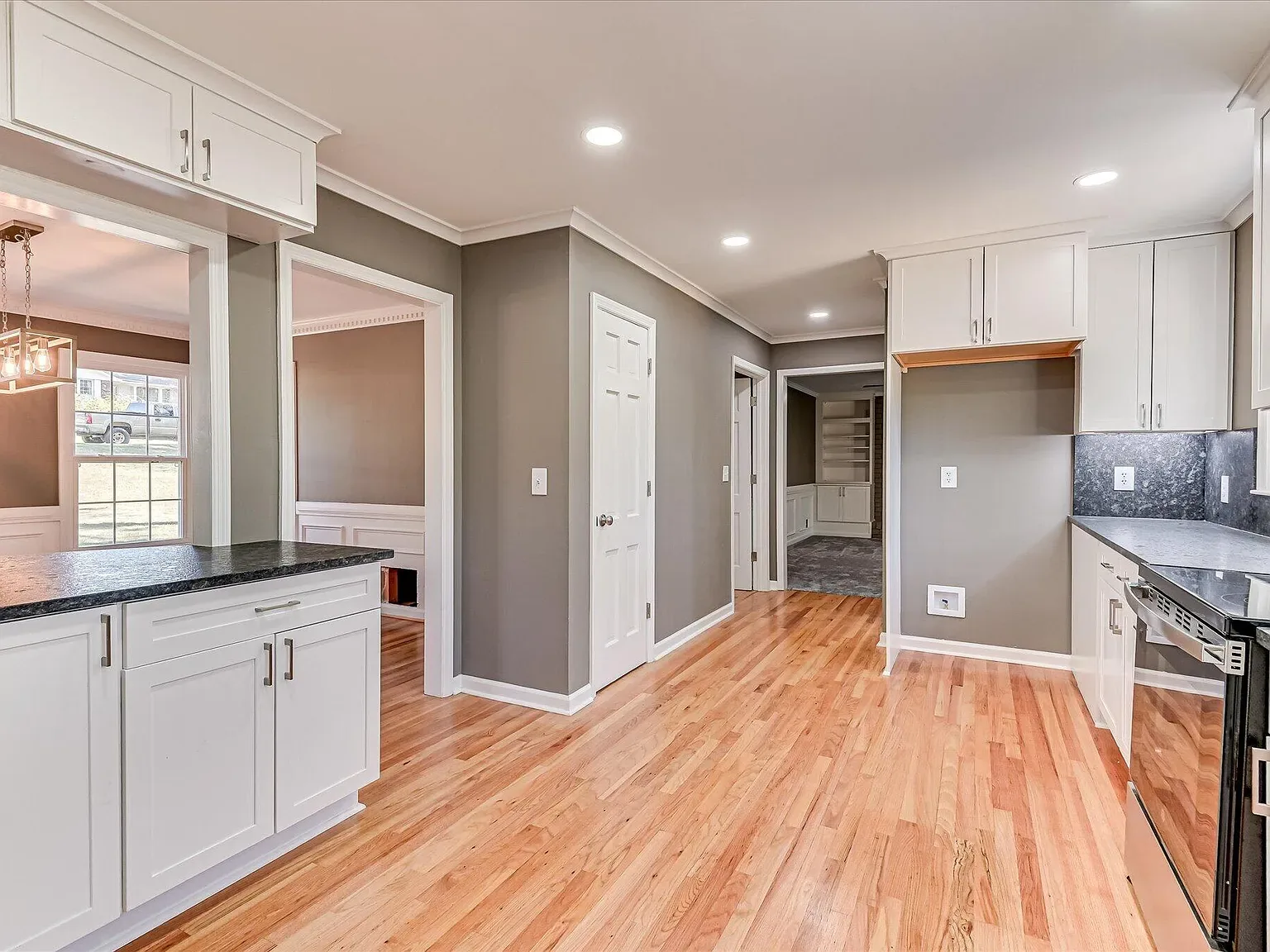 Kitchen island and hardwood flooring looking toward the living room at 814 Dunbarton Drive