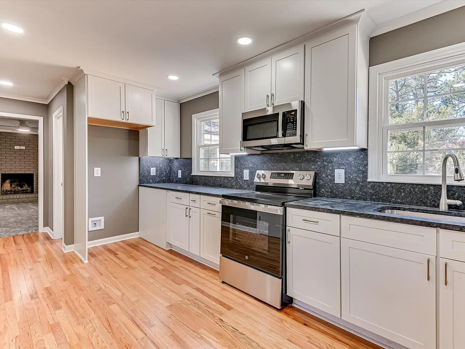 Renovated kitchen with stainless appliances and new cabinetry at 814 Dunbarton Drive in North Augusta